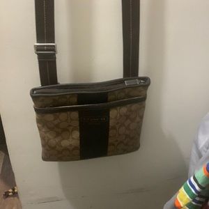 Men or women’s Coach crossbody-brown